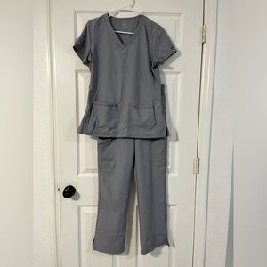 MedCouture Scrubs 
Top- Size S
Bottoms- Size M